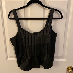 Versona Medium faux leather tank withh rubbed front detail.